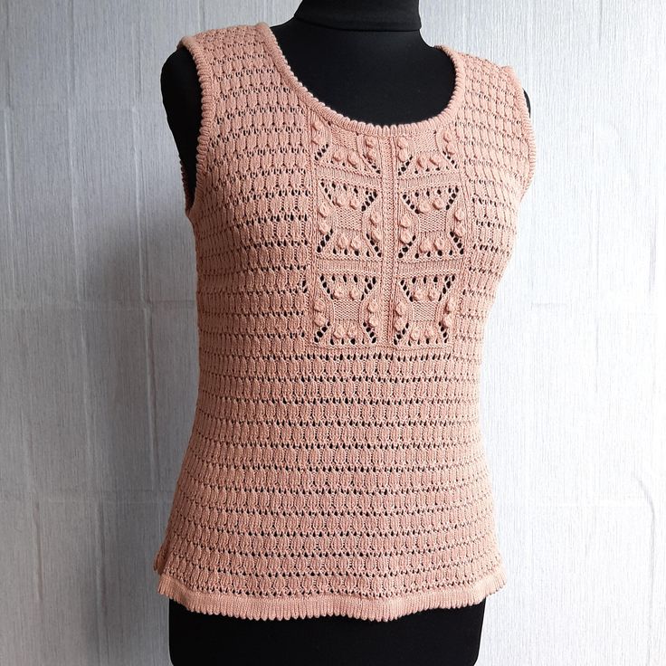 This beautiful women's pink tank top is knitted from high quality yarn (cotton). It is very soft, pleasant and comfortable. Knitted with very beautiful patterns The product is made in one copy, in one size (size S). Please pay attention to the measurements: Product length - 53 cm / 20.9 inch circumference - 88 cm / 34.6 inch Completely handmade in its idea and design. Light and soft, it will perfectly complement your wardrobe, ideal for creating a wide variety of looks. Will make your image femi Pink Knit Sleeveless Tank Top, Pink Knit Tank Top, Pink Sleeveless Knit Tank Top, Fitted Pink Sweater Vest For Summer, Pink Cotton Crochet Top, Handmade Beige Crochet Top, Beige Hand Knitted Tops, Casual Handmade Pink Tops, Fitted Pink Cotton Sweater Vest