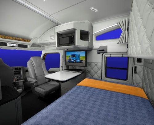 the interior of an airplane with two beds and televisions