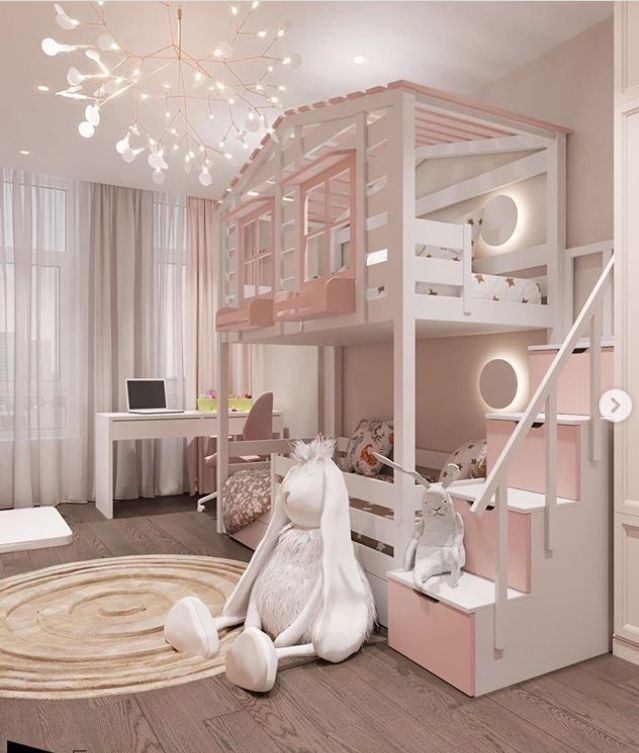 a child's bedroom with bunk beds and stairs