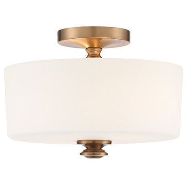 a light fixture with a white shade on it