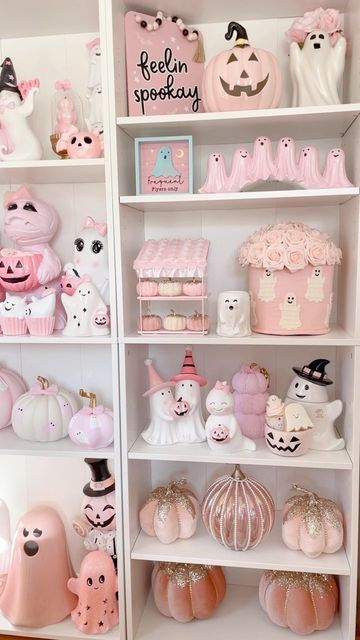 a shelf filled with lots of pink and white items