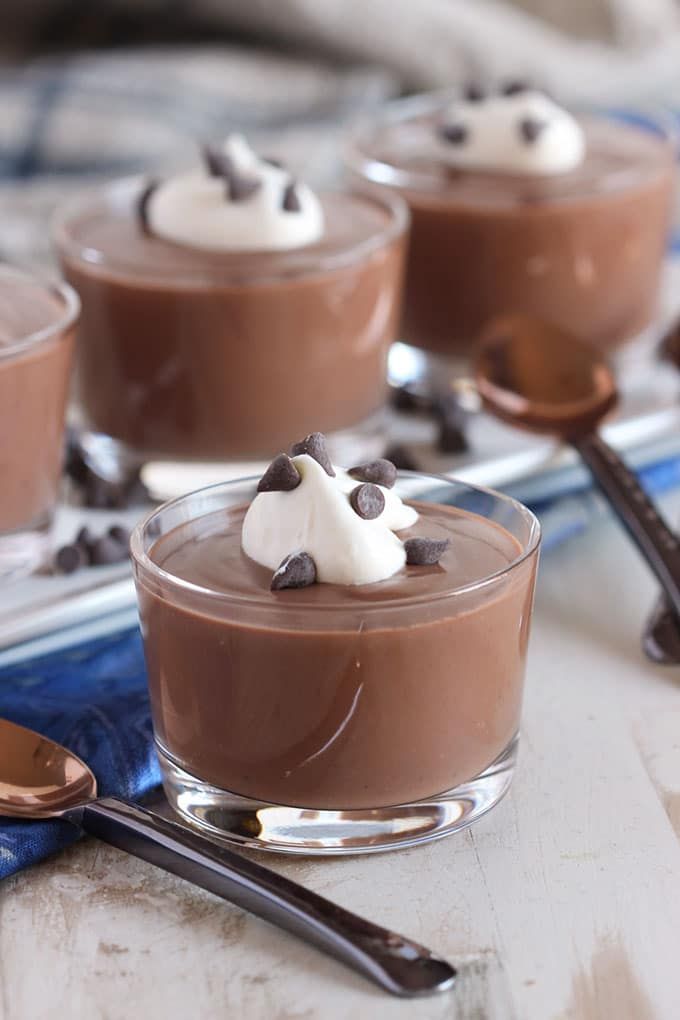 small desserts with chocolate pudding and whipped cream