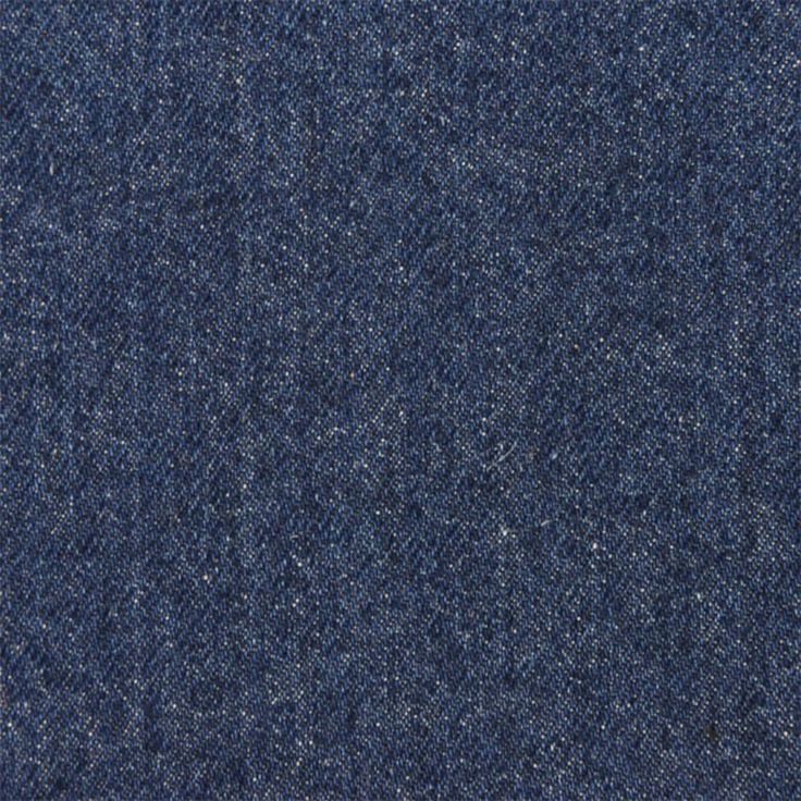 an up close shot of blue denim fabric textured with coarsed flecks