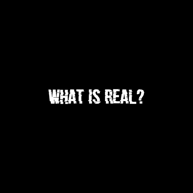 the words what is real written in white on a black background