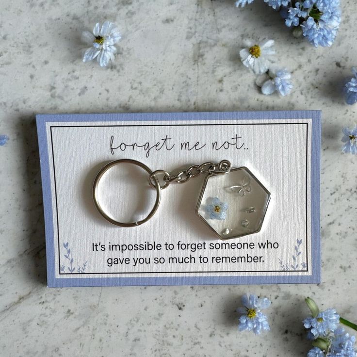 a keychain that says forget me not it's impossible to forget someone who gave you so much to remember