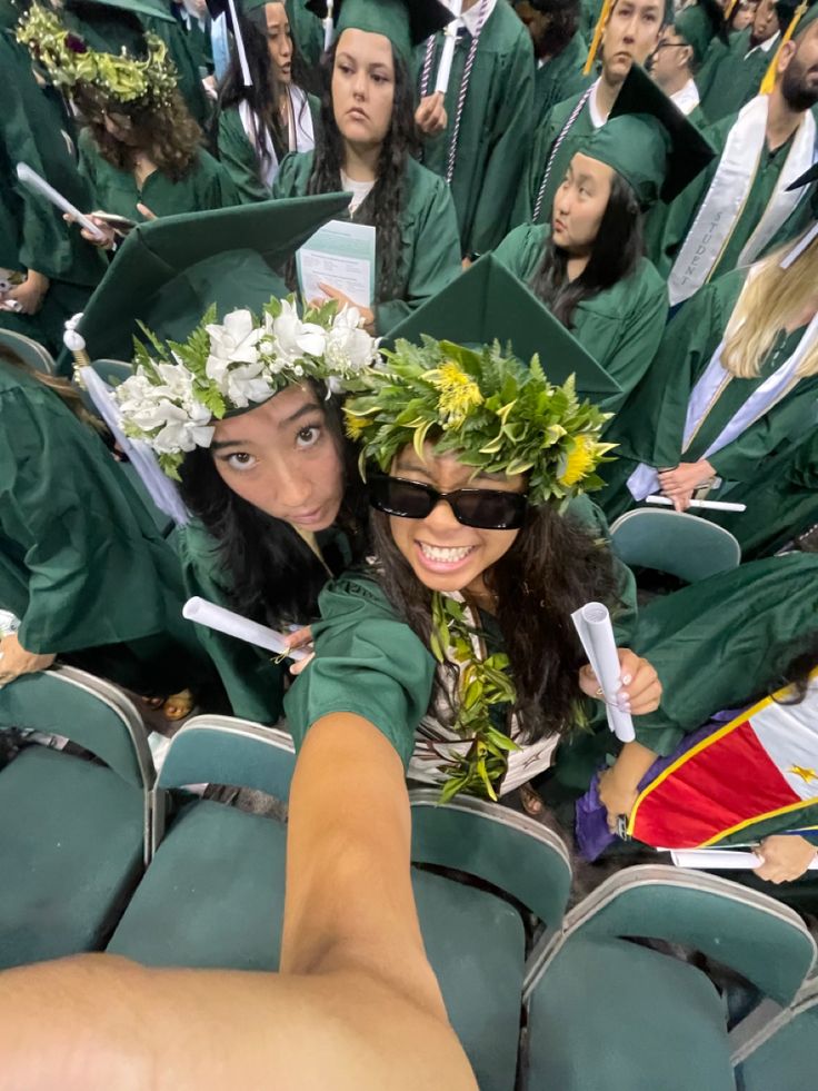 a group of people in graduation caps and gowns