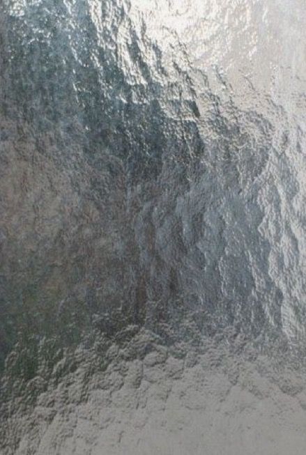 a close up view of a window with water on it