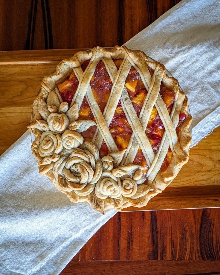 a pie sitting on top of a wooden table