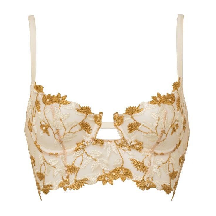 “Soraya’s gilded embroidery adorns the body with intricate craft, for a luxuriously indulgent look.” – Pia, Designer The Soraya Longline Bra is a Studio Pia bestseller. This balconette style is crafted from panels of delicate embroidered tulle, decorating your body in shimmering florals, inspired by the Art Nouveau period. The embroidered tulle is trimmed with sumptuous ivory, cruelty-free silk satin for added luxe. Silk-wrapped shoulder straps and adjustable back straps offer support for a natu Studio Pia, Delicate Lingerie, Large Gift Boxes, Bra Size Charts, White Bras, Embroidered Tulle, Longline Bra, Ivory Pearl, Large Gift