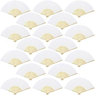 white paper fans with gold trims are arranged in a row on a white background