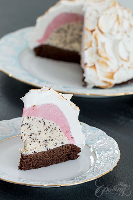 two plates with slices of cake on them