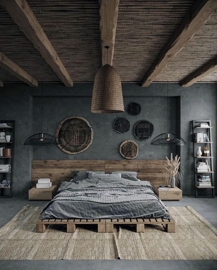 a large bed sitting in the middle of a bedroom next to a wooden shelf filled with books