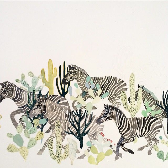 a painting of zebras and cactuses on a white wall