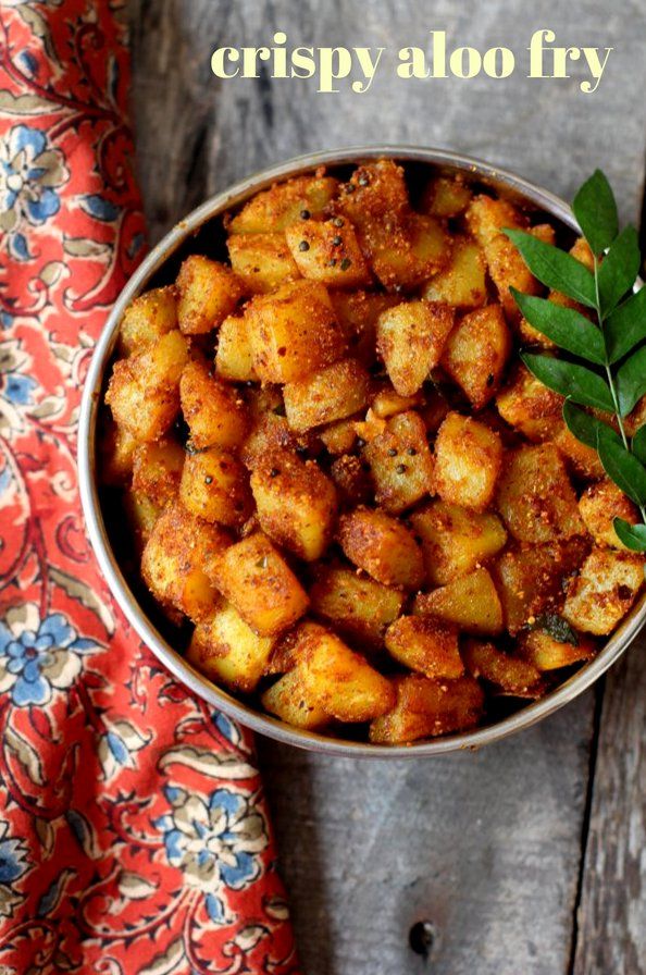 crispy aloo fry in a bowl with leaves on the side