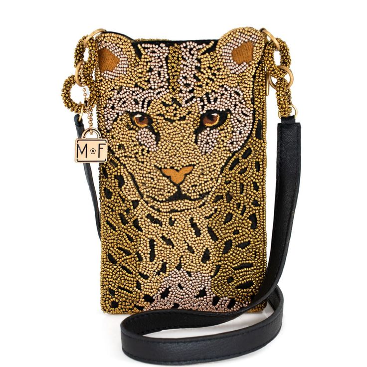 PRICES MAY VARY. Wild Style Statement: Unleash your inner fashionista with our Gone Wild Crossbody Phone Bag, featuring a fierce leopard print design that adds a bold touch to any outfit, making you stand out wherever you go. Convenient Carry: Designed for on-the-go adventures, this phone bag comes with a non-removable leather crossbody strap, allowing you to keep your hands free while you roam the urban jungle. Organized Essentials: Stay organized with a top compartment for your phone and a sid