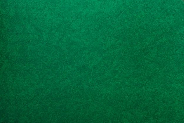 a green fabric textured background