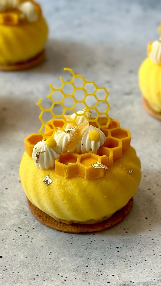 yellow dessert with honeycombs and icing on top