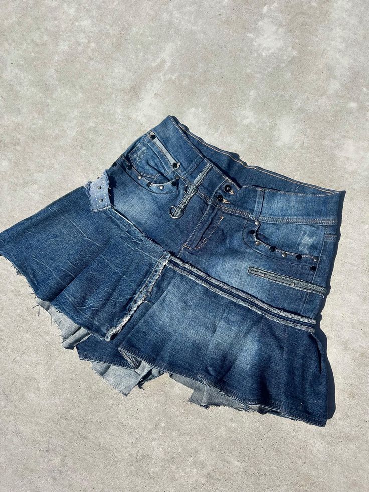 Upcycled unique denim skirt in dark blue color. Upcycled denim skirt made by me. Made of a lot of different pieces of jeans. Unique and unrepeatable. Material has elastane. Better fits M-L (measurements below). -handmade with love, always Follow us on instagram @callme.zesty If have any questions feel free to ask 👋🏻 Measurements Waist 80 cm / 31.4" Hips 104 cm / 40.9'' Length is about 36-45 cm / 14.17-17.71'' Y2k Denim Cutoff Mini Skirt, Y2k Style Cutoff Denim Mini Skirt, Y2k Cutoff Denim Mini Skirt, Fitted Denim Grunge Skirt, Y2k Style Dark Wash Mini Denim Skirt, Y2k Dark Wash Mini Denim Skirt, Y2k Dark Wash Cotton Skirt, Edgy Cutoff Dark Wash Denim Skirt, Edgy Dark Wash Cutoff Denim Skirt