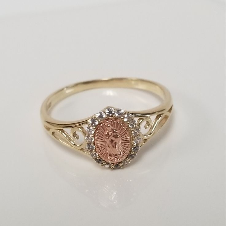 "Thanks for shopping our vintage estate store. We tend to sell well below wholesale and truly hope you enjoy all of our items. Many of the items are one of a kind, so please enjoy scrolling through the pictures and hopefully something will catch your eye. Beautiful estate 10k yellow rose gold Mother Mary cz diamond ring. I love this ring, so sweet. Size: 8 Setting: 9.5mm 3/8\" 8.5mm Weight: 1.82 gram Nice estate gold Mother Mary pendant, marked 10k." Virgencita Ring, Gold Virgin Mary Ring, Gold Our Lady Of Guadalupe Ring For Anniversary, Gold Rings Virgin Mary, Rose Mary Necklace, Gold Our Lady Of Guadalupe Necklace Gift, 14k Gold Our Lady Of Guadalupe Necklace, Dope Jewelry Accessories, Pretty Jewelry Necklaces