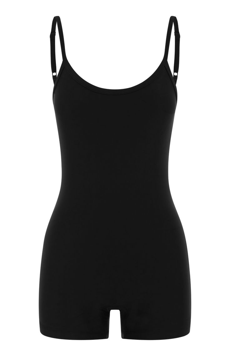 Introducing our newest suit, the 'Hawkins' in black, a stylish blend of retro design and practicality, perfect for ocean dips and catching waves. This one-piece bodysuit is crafted with your beach adventures in mind. Made from recycled stretch fabric and double-lined, it offers a snug fit that molds to your body, ensuring comfort and confidence throughout your water activities. With adjustable spaghetti straps and a low scooped back, the 'Hawkins' delivers both style and support, allowing you to Black Bodysuit For Surfing, Solid Compressive One-piece Bodysuit, Black Elastane One-piece Bodysuit, Black One-piece Bodysuit For Sunbathing, Black Beachwear Bodysuit With Built-in Bra, Sustainable Swimwear, One Piece Bodysuit, Water Activities, Black Bodysuit