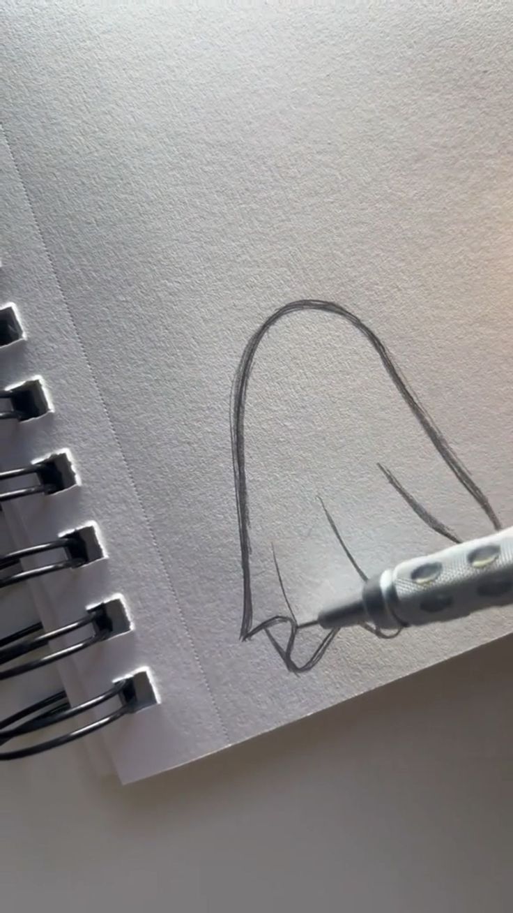 a drawing of a toothbrush on top of a piece of paper with black ink