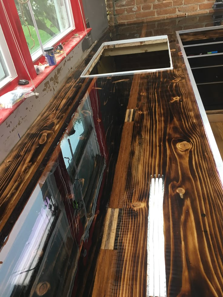 a kitchen counter top made out of wood