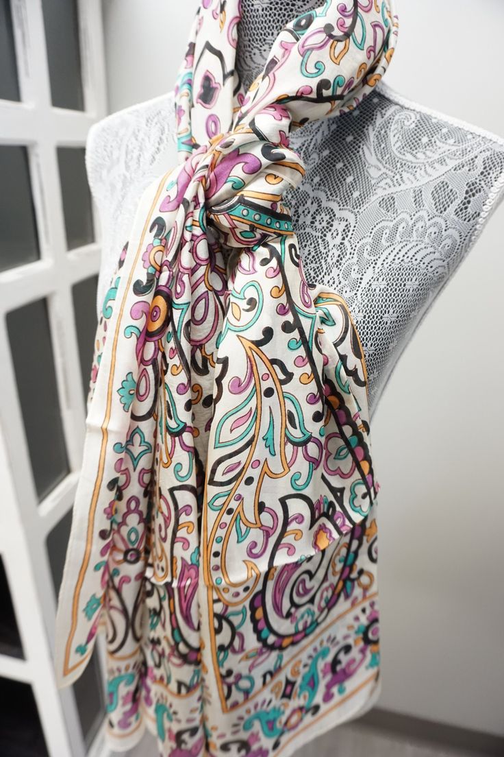 In a signature diaphanous floral print, this super soft Silk Scarf brings easy elegance to anything you wear it with. Big enough to wear as a wrap but fine enough to gather up and wear as a scarf. This tissue-weight scarf is made from a super soft silk blend in a variety of prints. One of a kind, unique individual piece. ** 72”x36” ** Hand Made ** 100% Silk ** Dry Clean only Product Type Premium Silk Scarves Overall 72"x36" Overall Product Weight 0.2 lbs Materials Silk Material Detail 100% Silk Elegant Printed Silk Scarf, Elegant Floral Print Silk Scarf, Luxury Silk Scarves With Floral Print, Kantha Sari, Luxury Artistic Silk Scarf With Floral Print, Silk Floral Print Shawl Scarf, Silk Scarf Wrap, Block Printed Textiles, Silk Material