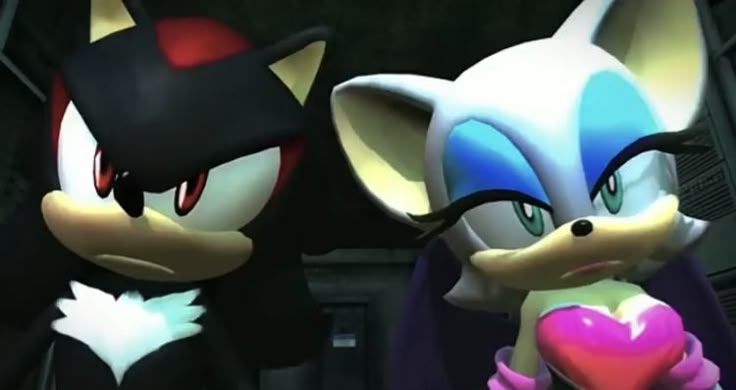 two sonic and tails characters standing next to each other