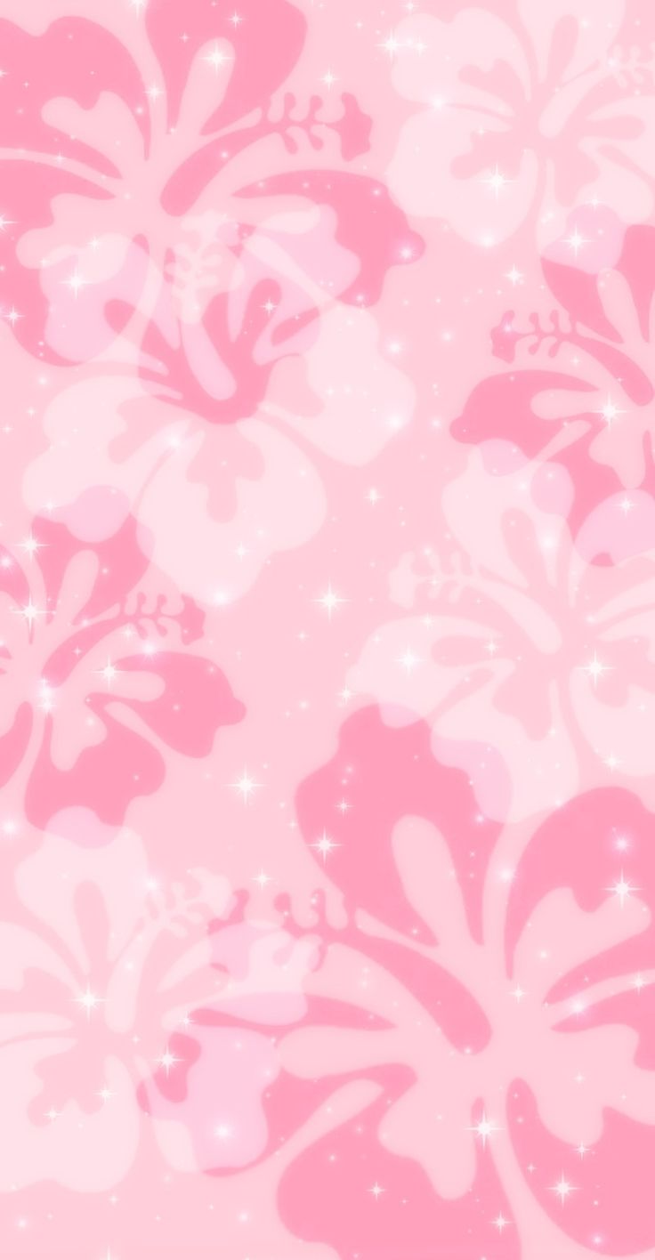 a pink and white flower pattern with sparkles