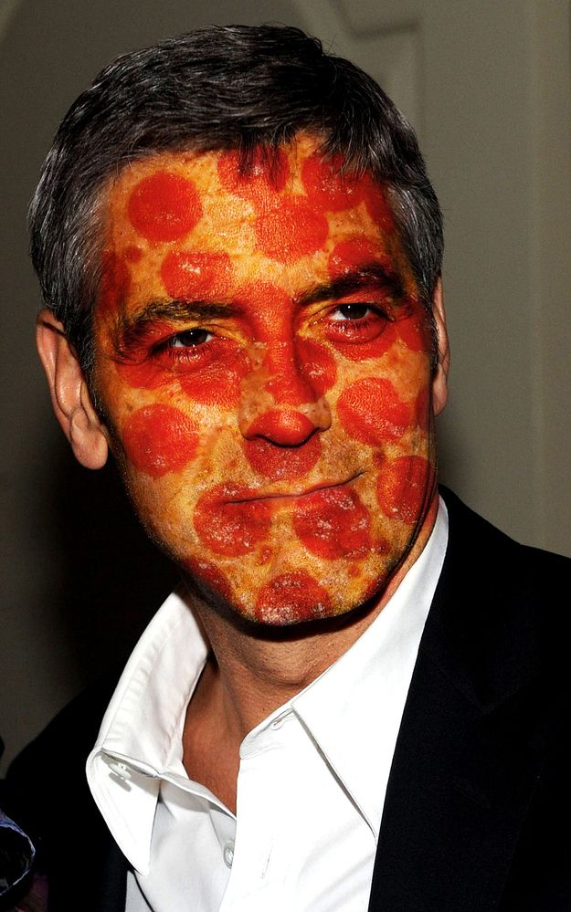 a man with pizza on his face