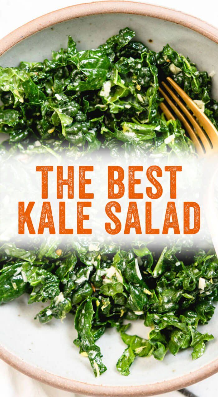 the best kale salad is in a bowl with a fork and knife next to it