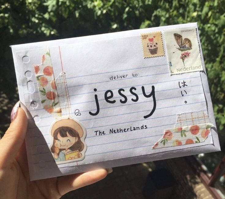 a person holding up a piece of paper with the words jessy on it