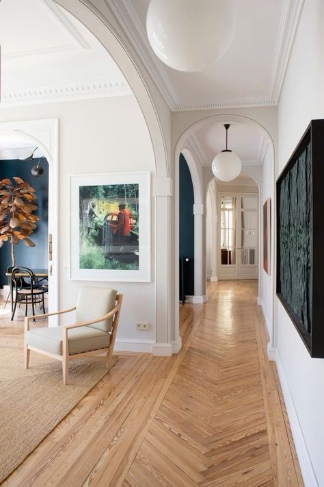 the hallway is clean and ready for guests to use it as an art gallery or office