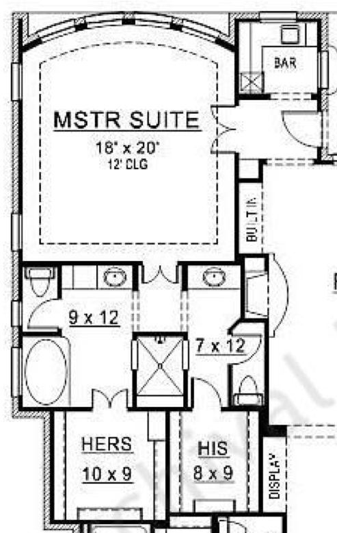 the floor plan for a two story house with an attached bathroom and living room area