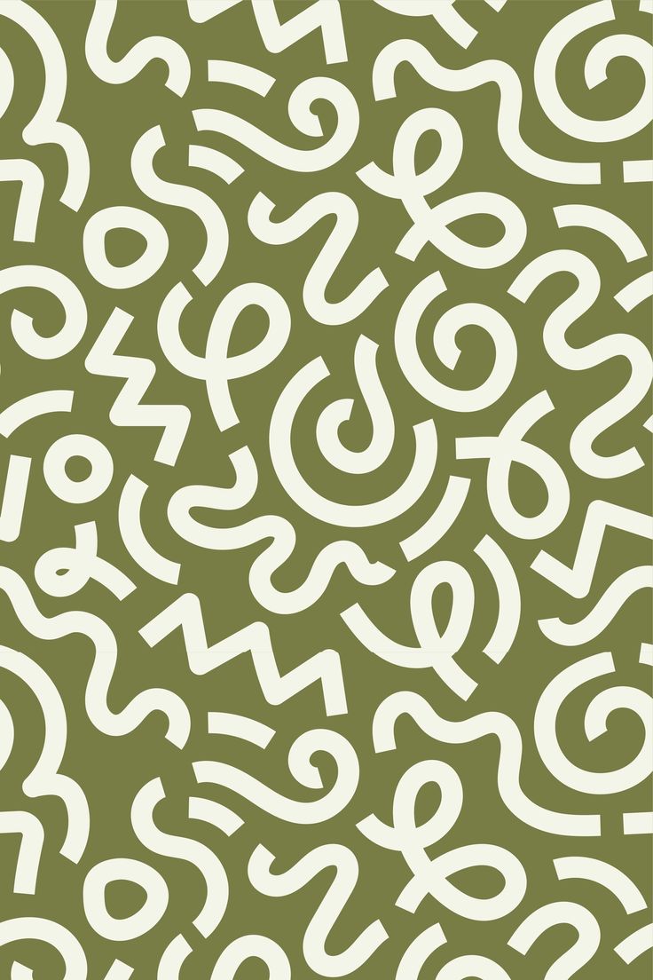 a green and white pattern with letters on it