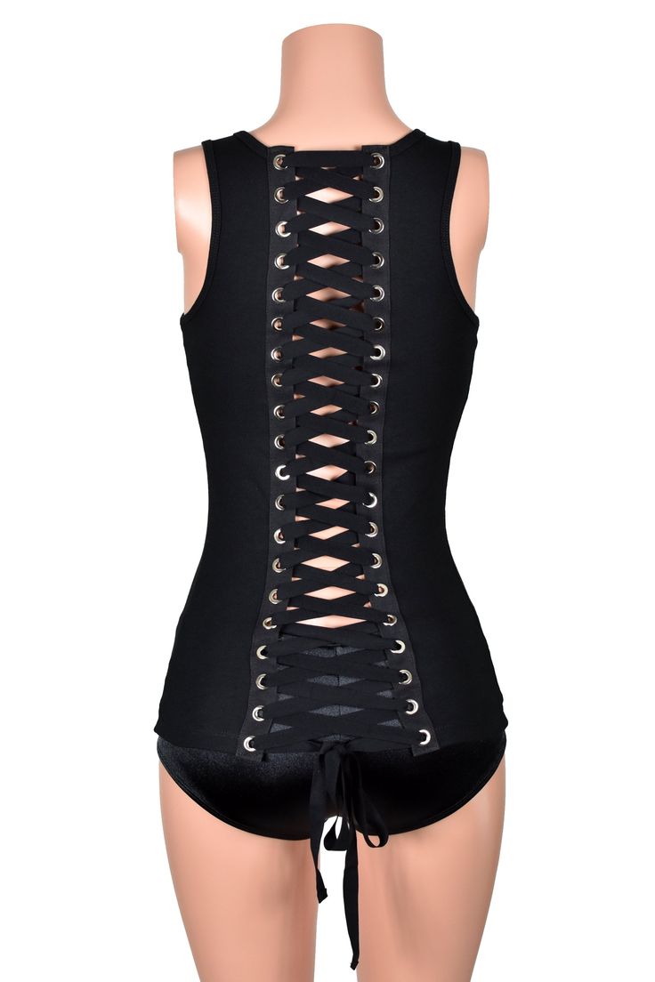 *Free USA shipping! *Handmade after you order: check order processing times This extra long black tank top has many rows of jumbo grommets and black elastic corset lacing going down the back. It has a square scoop neck and racer back. Note: the mannequin is wearing the top over Low Rise Satin Booty Shorts. The shorts are sold separately and are not attached to the top. ♦LENGTH: about 26-28 inches total (depending on size) ♦FABRIC TYPE: 52% cotton, 48% polyester micro rib knit♦FEATURES: silver me Fitted Tank Top For Club, Fitted Tank Vest For Club, Black Corset With Tank Straps And Corset Back, Black Stretch Corset With Straps, Black Corset With Tank Straps, Corset Back Tank Top For Night Out, Stretch Sleeveless Bandage Corset, Sleeveless Club Top With Corset Back, Sleeveless Stretch Bandage Corset