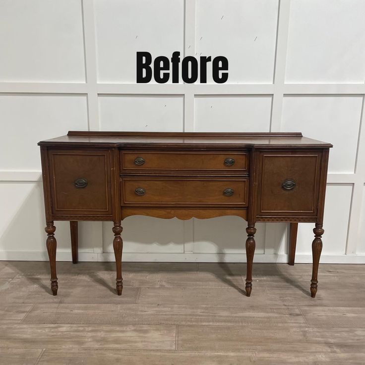 an old wooden desk with the words before painted on it