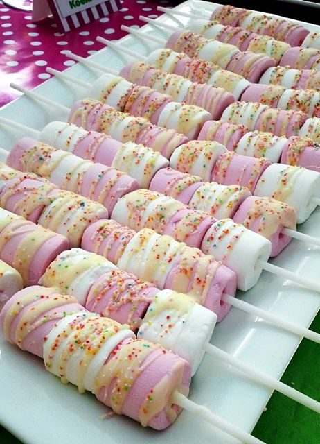 there are many marshmallows with sprinkles on them