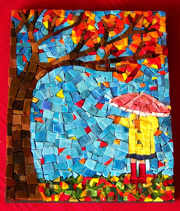 a colorful mosaic art piece with a person holding an umbrella