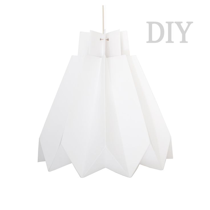 three white paper bags are hanging from a string with the words diy on it