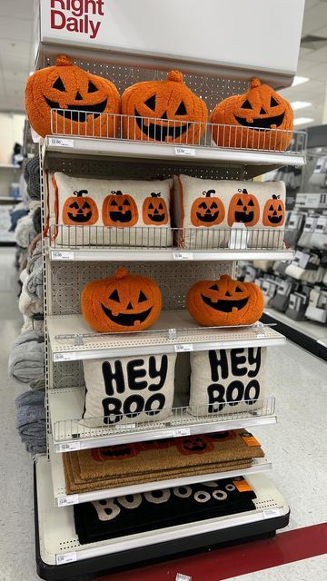 pumpkins are on display in a store for halloween decorations and decorating ideas,