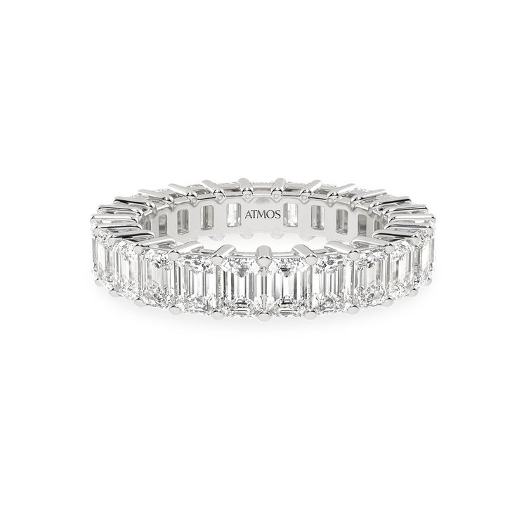 Emerald Eternity Atmos Band_Product Angle_5 Ct. - 1 Elegant White Emerald Cut Eternity Band, Fine Jewelry Diamond White Emerald Cut Eternity Band, Fine Jewelry Green Emerald Cut Eternity Band, Luxury Silver Emerald-cut Eternity Band, Luxury White Emerald-cut Eternity Band, Classic Display, Emerald Eternity Band, Traditional Wedding Bands, Continuous Line