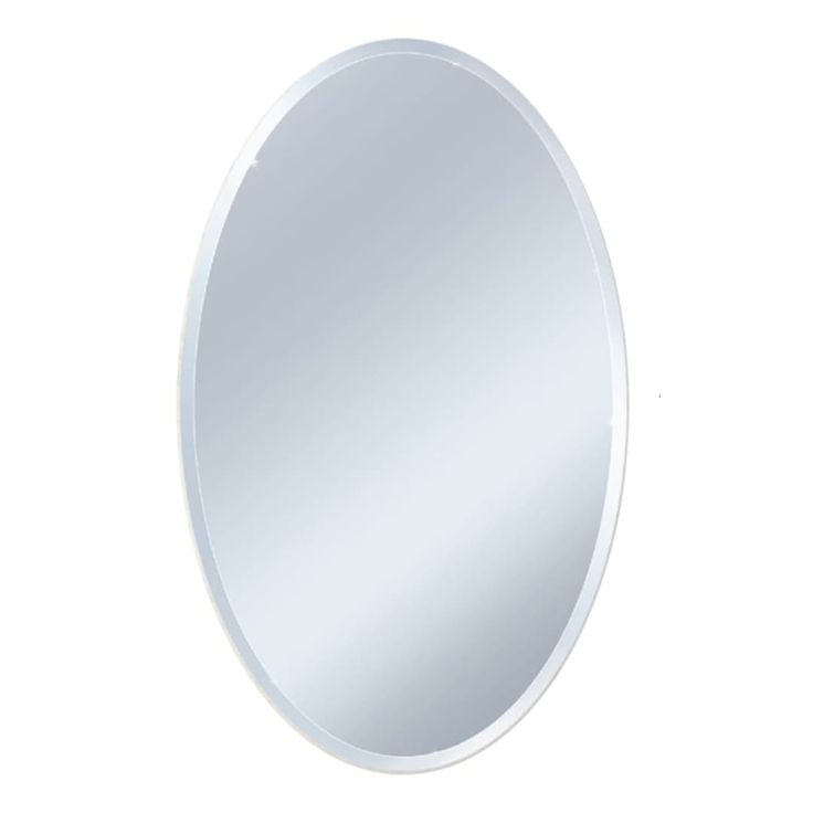 an oval mirror on a white wall