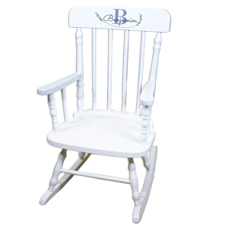 a white wooden rocking chair with the letter b on it's back and seat