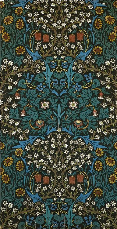 an intricately designed rug with blue, green and brown flowers on the bottom half