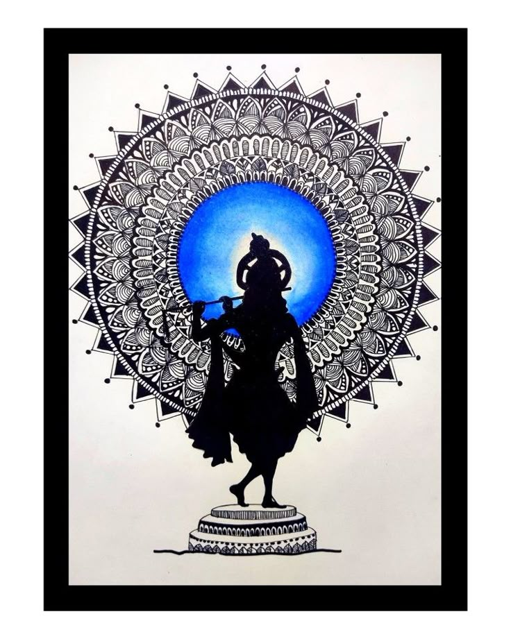 the silhouette of a person standing in front of a blue circle with an intricate design on it