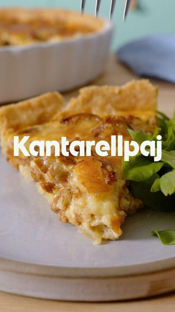 a piece of quiche on a plate with a fork in it and the words kanttarellipai above it