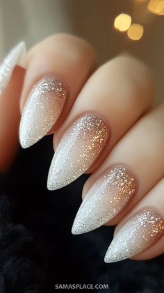 Nails Design Winter 2024, White Nails With Glitter Almond Shape, New Years Eve Nails White And Silver, Gold And White New Years Nails, Silver And White Ombre Nails, White Nails With Gold Sparkles, White Champagne Nails, White Nails Silver Design, Winter Glitter Gel Nails