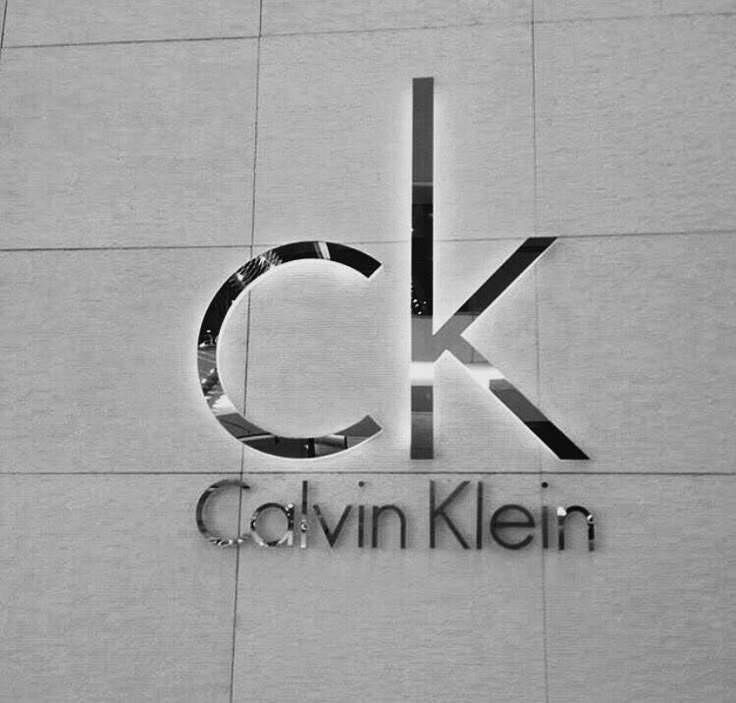 black and white photo of the logo for calvin klein's new store