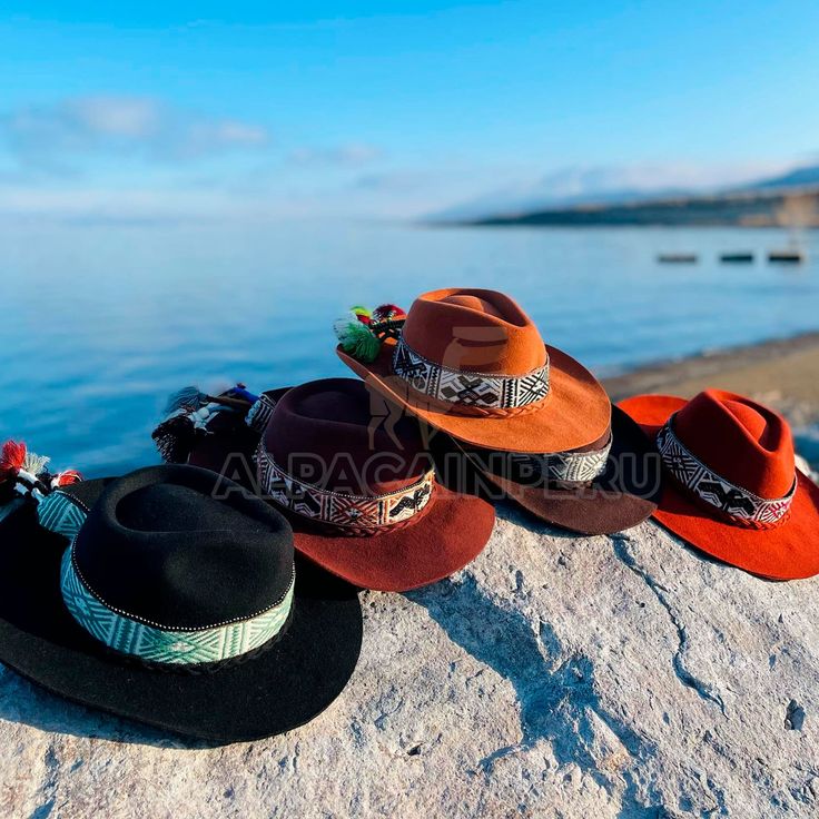 "Hat made of alpaca wool, with Inka Q'ero woven band, made by Peruvian artisans. Our western style hats are made of 100% wool and felt and the removable hand embroidered band, made in 100% alpaca wool.  Each one is carefully crafted, hand molded and made with LOVE! The alpaca wool is soft, warm and durable, ensuring that you will be able to enjoy this hat for many years to come. Sizes: Small: 56-57 cm; 22\"-24\" in. Medium: 58-59 cm; 22.8\"-23.2\" in. Large: 60-61 cm; 23.6\"-24\" in. Important: Dimensions are approximate, each plush toy is unique, might have a slight difference with the photos because it is individually handmade, there are not 2 of the same version. Colors may appear slightly different from photos due to mobile or computer screen settings and resolution." Western Brimmed Hat Band Handwoven, Western Brimmed Handwoven Hat Band, Handwoven Western Hat Band For Brimmed Hats, Western Style Felt Beach Cap, Adjustable Felt Cap For The Beach, Adjustable Felt Beach Cap, Western Style Handwoven Festival Hat, Beach Felt Cap, Western Style Handwoven Hats For Rodeo